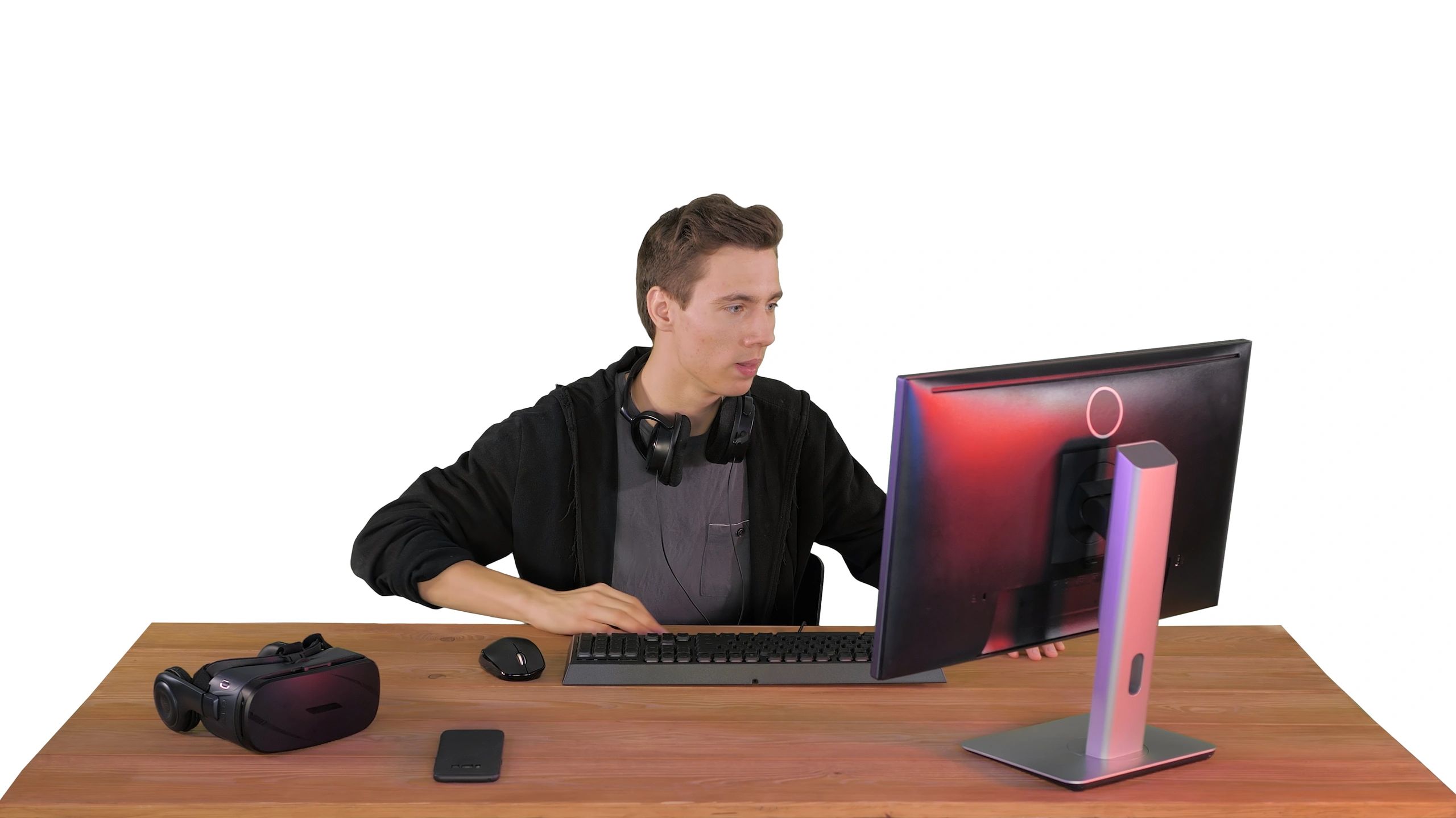 PC gaming setup with a creator focused on the screen
